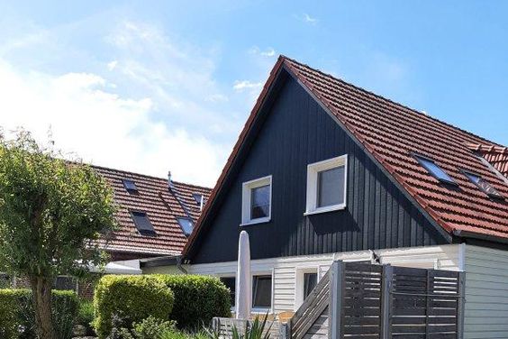 Wohnung mit TERRASSE im Anbau eines Zweifamilienhauses