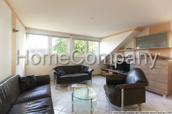 Stylish attic storey abode, with use of courtyard garden, in quiet location. Good underground rail and local rail links.