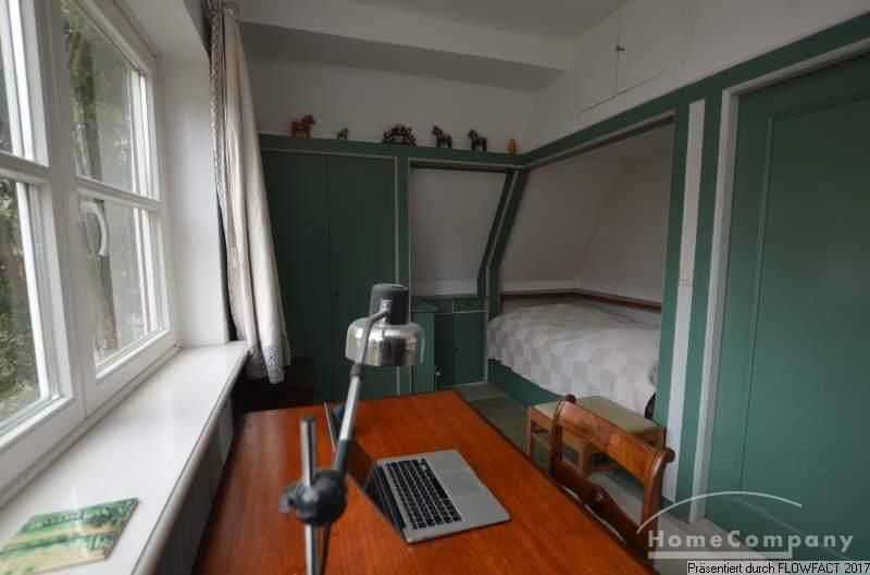 Schlafzimmer 2 mit Arbeitsplatz und Sitzecke