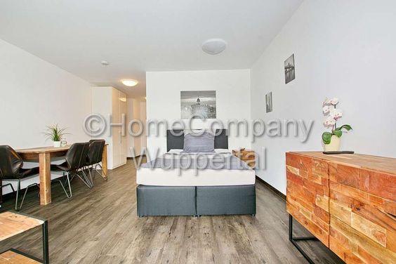 Neues Business- Apartment im Industrial-Style mit Süd-Balkon, DSL-Wifi und Reinigungsservice