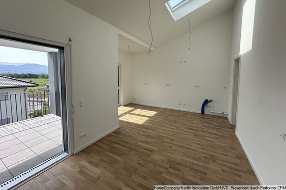 W105 | Stilvolle Neubau-Wohnung im 2.OG und somit Dachgeschoss mit Balkon, Einbauküche, Kellerraum und TG-Stellplätzen