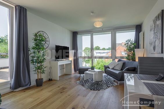 Wunderschöne, voll möblierte 2-Zimmer-Wohnung über zwei Ebenen mit herrlicher Dachterrasse in Moosach