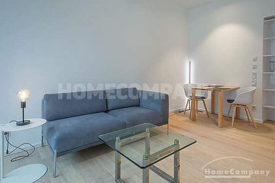 Modern und hochwertig möbliertes 1,5-Zimmer-Apartment mit Balkon in der Au.