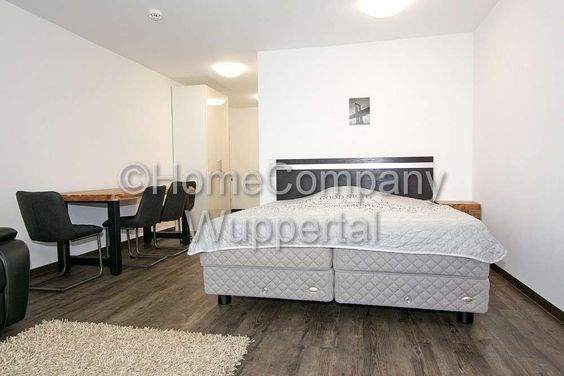 Business- Apartment im Industrial-Style mit Süd-Balkon, DSL-Wifi und Reinigungsservice